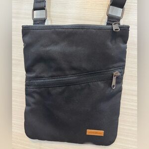Eddie Bauer Black Crossbody Bag with Durable Fabric and Minimalist Design